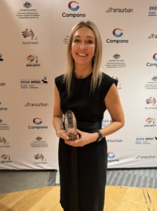 Sjaan Koppel holding Women in Road Safety Award from Australasian College of Road Safety